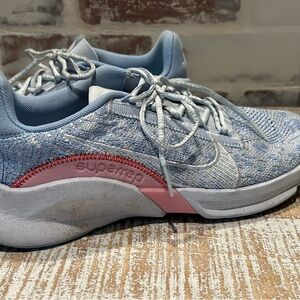 Nike Blue and Pink Athletic Shoes with Cushioned Midsole